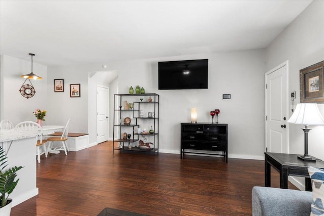 103 Lei Ct, Bastrop, TX 78602 - living area with wood finished floors and baseboards