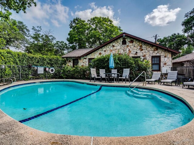 3815 Menchaca Rd Unit 19, Austin, TX 78704 - community pool featuring a patio area