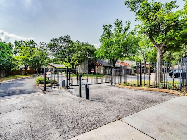 3815 Menchaca Rd Unit 19, Austin, TX 78704 - view of front of home with a gate and a residential view