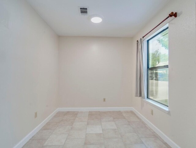 3815 Menchaca Rd Unit 19, Austin, TX 78704 - spare room with baseboards