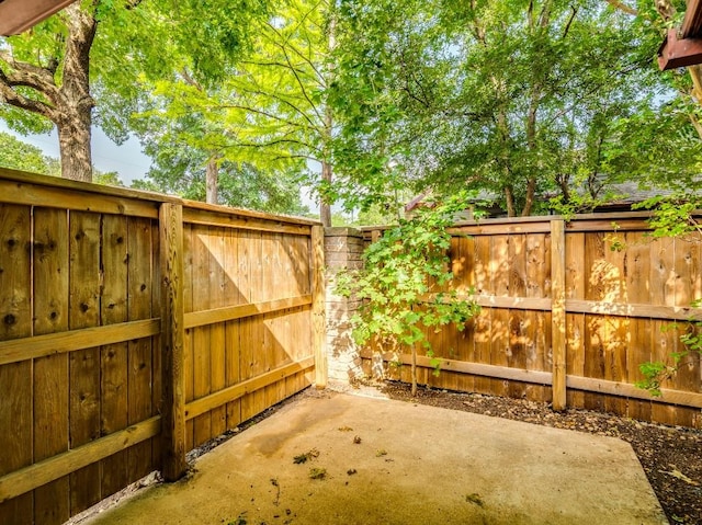 3815 Menchaca Rd Unit 19, Austin, TX 78704 - fenced backyard featuring a patio