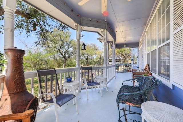 418 Grace Ln, Austin, TX 78746 - porch featuring a ceiling fan