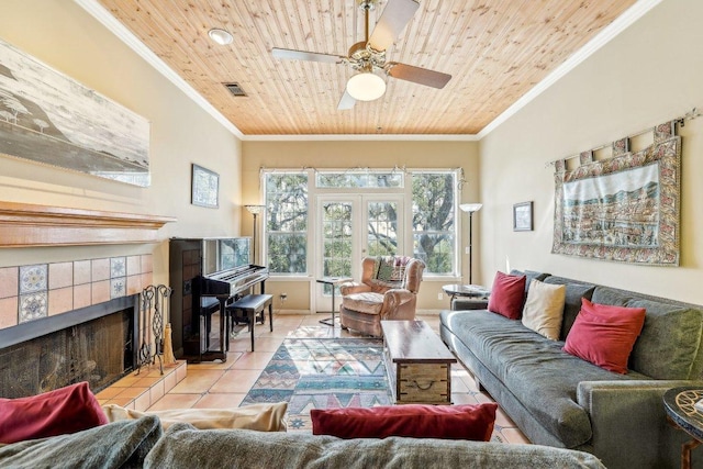 418 Grace Ln, Austin, TX 78746 - living area featuring ornamental molding, tile patterned floors, wood ceiling, a fireplace, and a ceiling fan