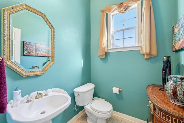 418 Grace Ln, Austin, TX 78746 - bathroom featuring a sink and tile patterned floors