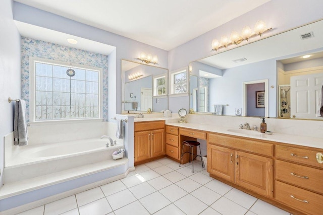 418 Grace Ln, Austin, TX 78746 - full bath featuring double vanity, a garden tub, and tile patterned floors
