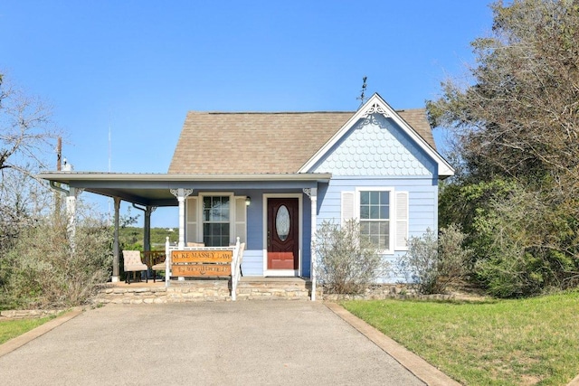 418 Grace Ln, Austin, TX 78746 - view of front facade with a porch