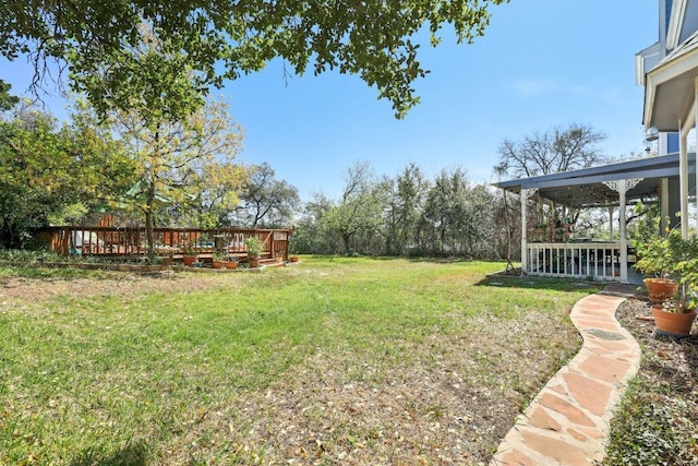 418 Grace Ln, Austin, TX 78746 - view of grassy yard with a deck