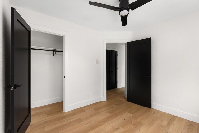 2716 Gettysburg Dr, Austin, TX 78745 - unfurnished bedroom featuring light wood-style flooring, baseboards, and a closet