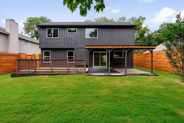 2716 Gettysburg Dr, Austin, TX 78745 - back of property featuring a patio and a wooden deck