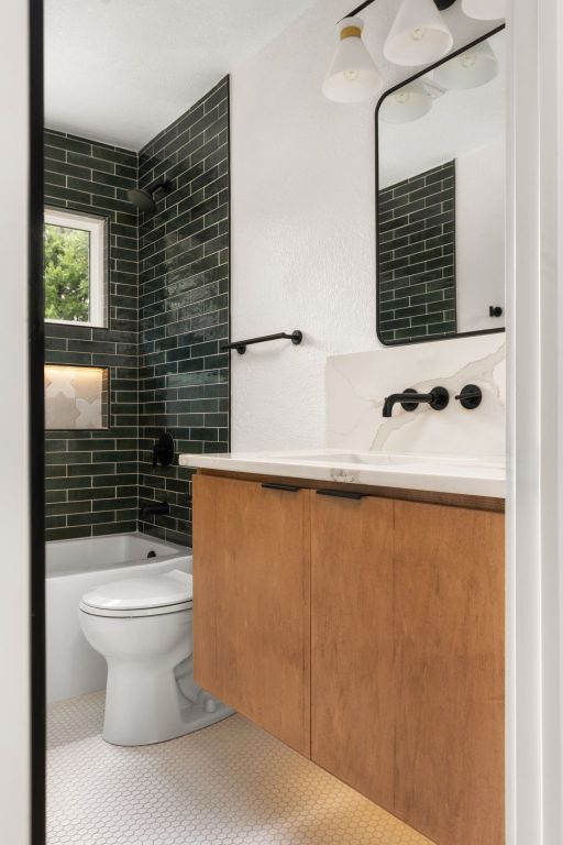2716 Gettysburg Dr, Austin, TX 78745 - bathroom with vanity, toilet, and shower / tub combination