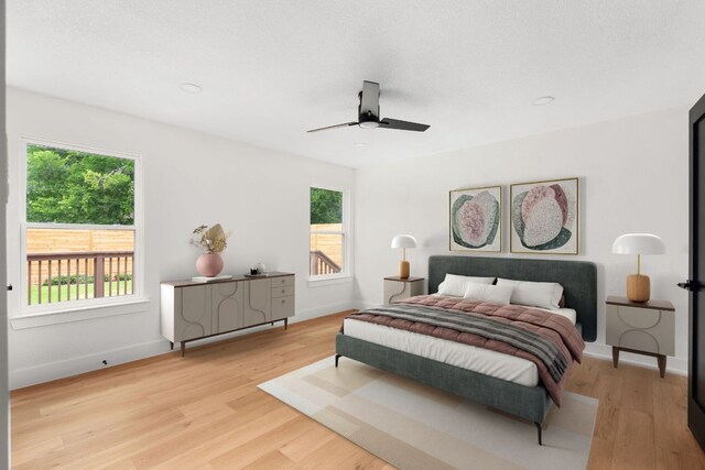 2716 Gettysburg Dr, Austin, TX 78745 - bedroom featuring light wood-style floors, baseboards, and a ceiling fan