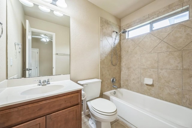 20125 Chayton Cir, Pflugerville, TX 78660 - full bath with toilet, shower / bathtub combination, vanity, a ceiling fan, and a textured wall