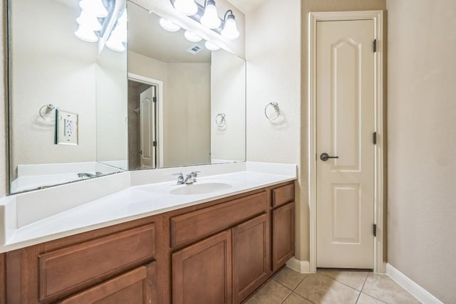 20125 Chayton Cir, Pflugerville, TX 78660 - bathroom featuring tile patterned floors, vanity, and baseboards