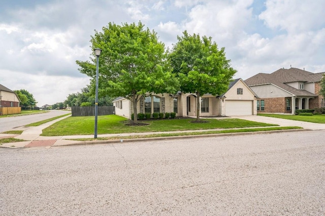 20125 Chayton Cir, Pflugerville, TX 78660 - view of property hidden behind natural elements with a garage, concrete driveway, and brick siding