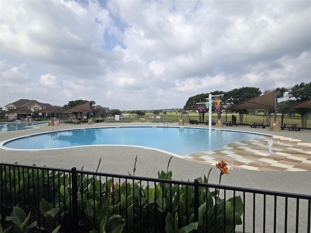 20125 Chayton Cir, Pflugerville, TX 78660 - community pool featuring a patio and a gazebo