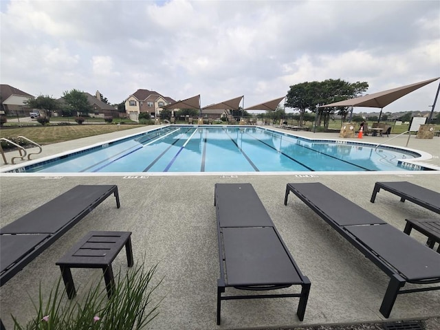 20125 Chayton Cir, Pflugerville, TX 78660 - community pool with a patio area