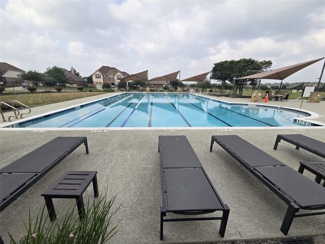 20125 Chayton Cir, Pflugerville, TX 78660 - community pool featuring a patio area