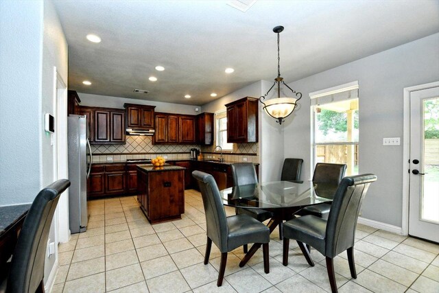 2807 Checker Dr, Cedar Park, TX 78613 - dining space with light tile patterned floors and recessed lighting