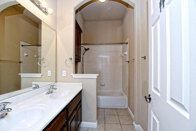 2807 Checker Dr, Cedar Park, TX 78613 - bathroom featuring double vanity, shower / bathtub combination, tile patterned flooring, and baseboards