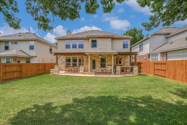 2807 Checker Dr, Cedar Park, TX 78613 - rear view of house featuring a chimney, a patio area, ceiling fan, and stone siding
