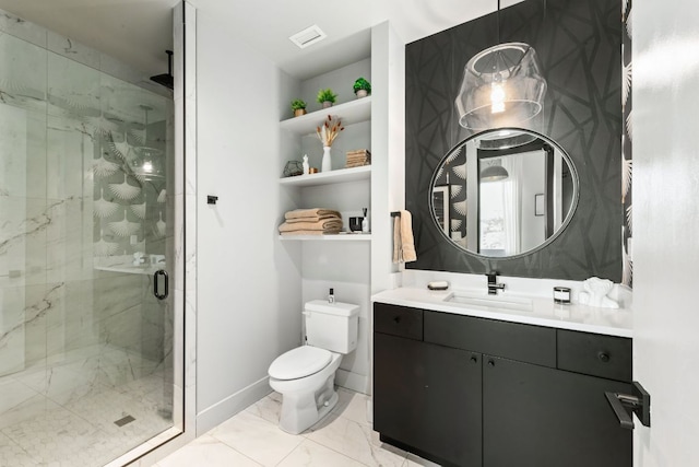 800 W 5th St Unit 902, Austin, TX 78703 - bathroom with marble look tile flooring, a shower stall, toilet, vanity, and built in features