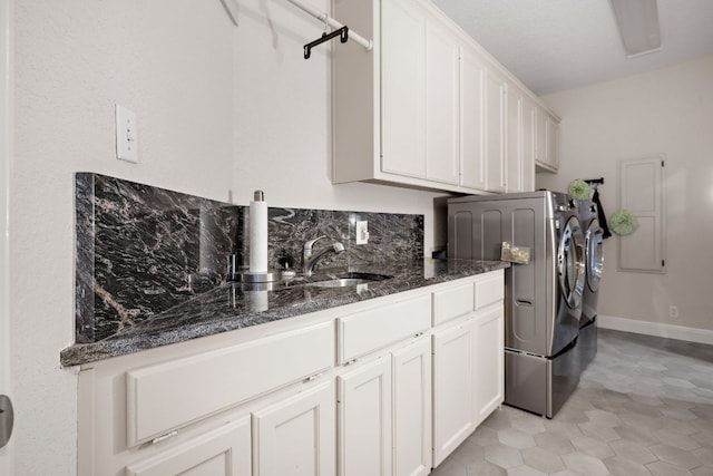 11 Meadow Run, Round Rock, TX 78664 - washroom with cabinet space and separate washer and dryer