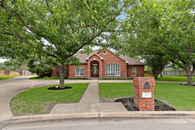 11 Meadow Run, Round Rock, TX 78664 - traditional home featuring brick siding