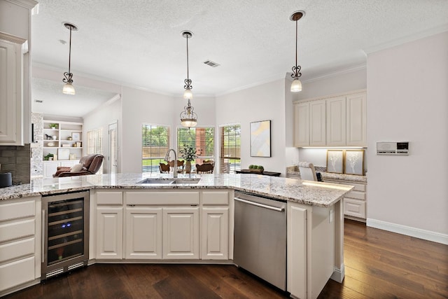 11 Meadow Run, Round Rock, TX 78664 - kitchen with beverage cooler, stainless steel dishwasher, a sink, ornamental molding, and dark wood finished floors