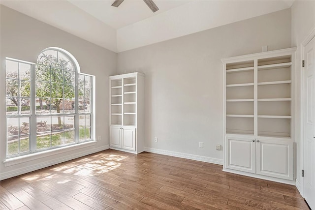 9010 Bluegrass Dr, Austin, TX 78759 - unfurnished room with wood finished floors, ceiling fan, and baseboards