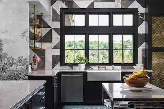 102 Crestwood Ct, Austin, TX 78746 - kitchen featuring dishwasher, dark cabinetry, plenty of natural light, and a sink