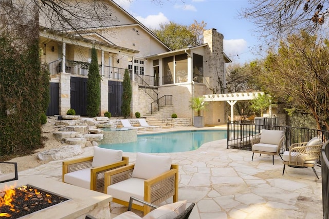 102 Crestwood Ct, Austin, TX 78746 - view of swimming pool featuring stairway, a patio, an outdoor living space with a fire pit, and a pool with connected hot tub
