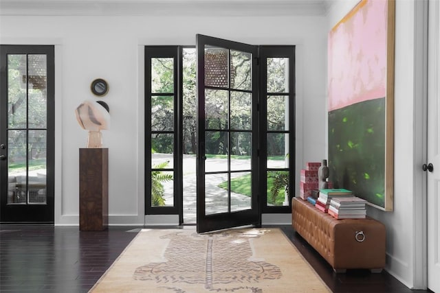 102 Crestwood Ct, Austin, TX 78746 - entryway with wood finished floors, crown molding, and plenty of natural light