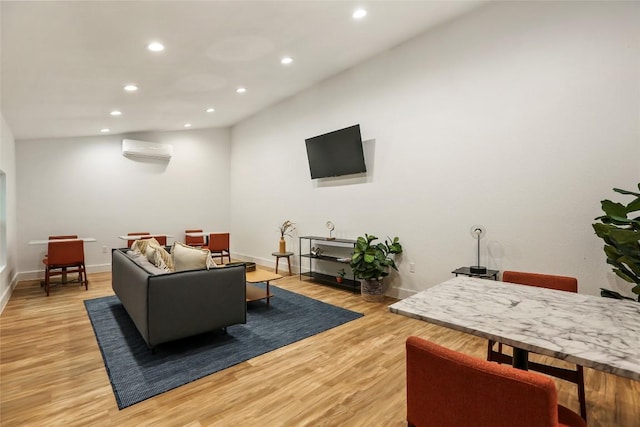 2000 Glen Allen St Unit 2, Austin, TX 78704 - living area with a wall mounted air conditioner, recessed lighting, baseboards, and light wood finished floors