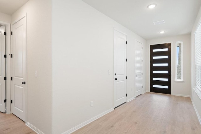 2008 Kit Cir, Austin, TX 78758 - entryway with light wood finished floors, baseboards, and recessed lighting