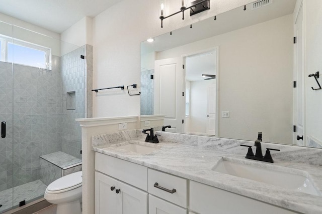 2008 Kit Cir, Austin, TX 78758 - full bath with toilet, a stall shower, and double vanity