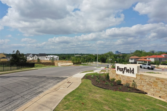 2008 Kit Cir, Austin, TX 78758 - view of asphalt road featuring street lights, sidewalks, and curbs