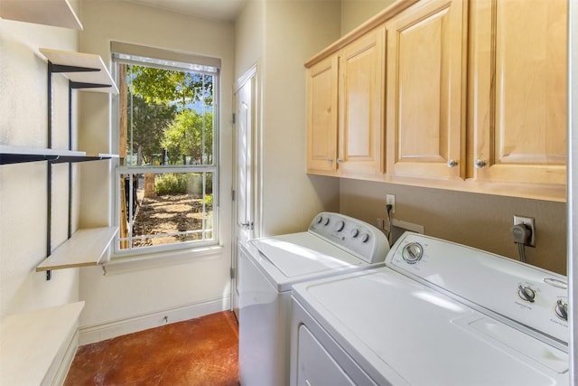 4671 Fischer Store Rd, Wimberley, TX 78676 - washroom featuring cabinet space, washer and clothes dryer, and baseboards