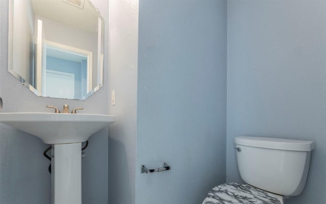 3907 Sojourner St, Austin, TX 78725 - half bath with toilet and a sink