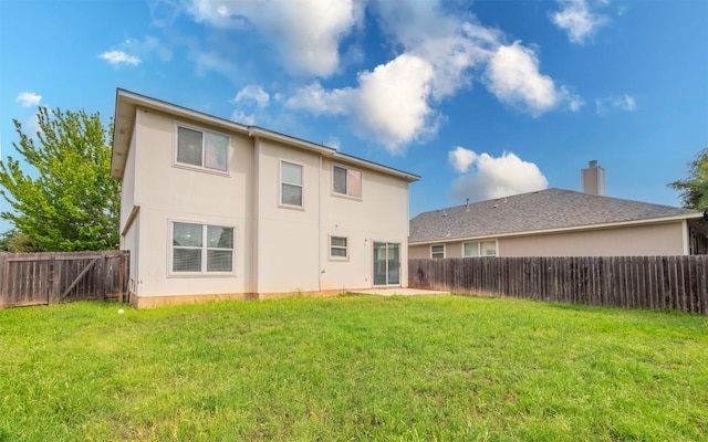3907 Sojourner St, Austin, TX 78725 - rear view of house with stucco siding