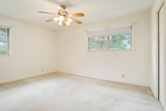 4412 Briar Cliff Rd, Temple, TX 76502 - carpeted empty room with plenty of natural light and a ceiling fan