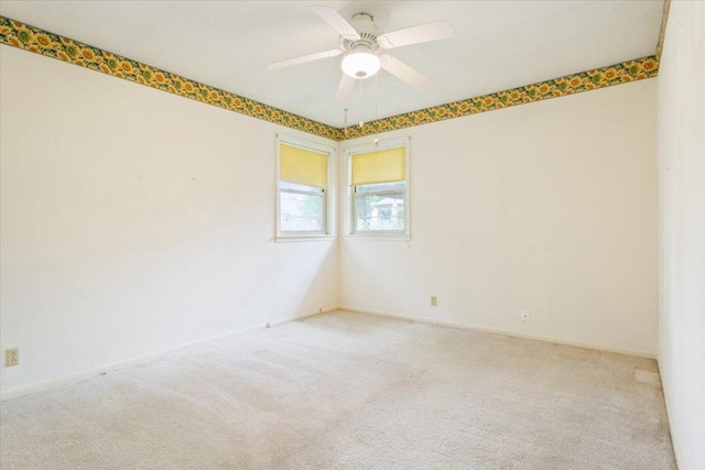 4412 Briar Cliff Rd, Temple, TX 76502 - carpeted empty room with a ceiling fan and baseboards