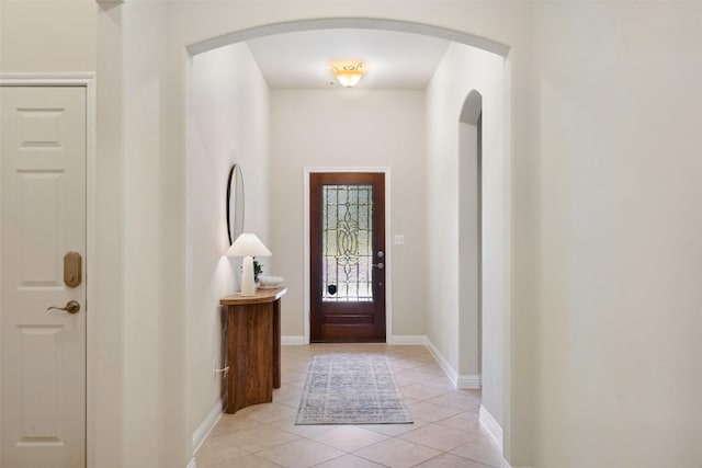 2944 Castellan Ln, Round Rock, TX 78665 - entryway with light tile patterned flooring and arched walkways