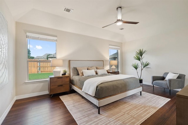 2944 Castellan Ln, Round Rock, TX 78665 - bedroom with dark wood finished floors, a ceiling fan, and vaulted ceiling