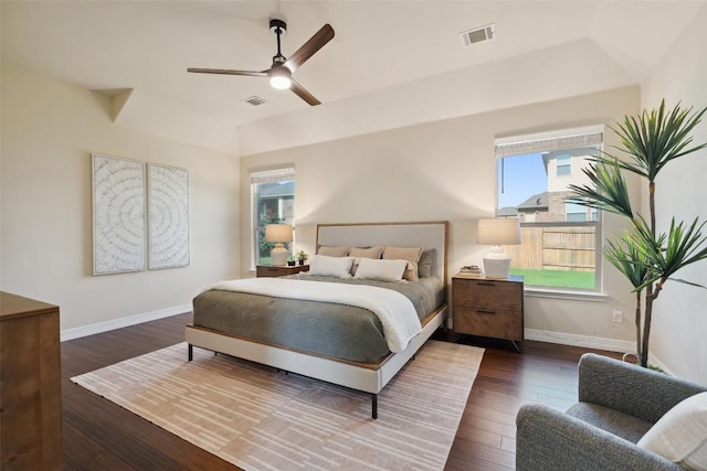 2944 Castellan Ln, Round Rock, TX 78665 - bedroom with multiple windows, dark wood-style floors, and ceiling fan