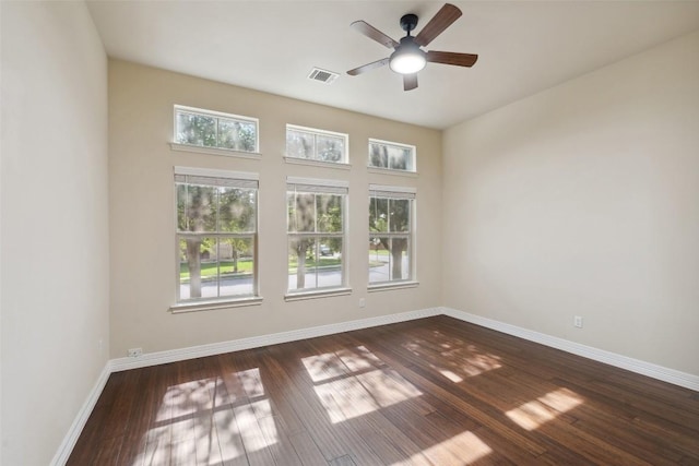 2944 Castellan Ln, Round Rock, TX 78665 - spare room with a ceiling fan and dark wood finished floors