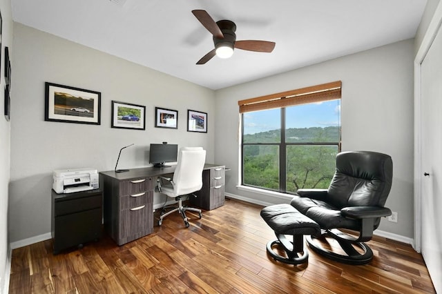2009 S Oak Canyon Rd, Austin, TX 78746 - office area featuring a ceiling fan, baseboards, and dark wood-style floors