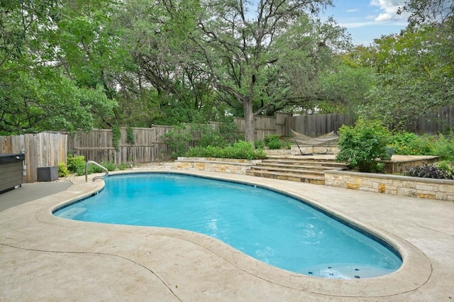 2009 S Oak Canyon Rd, Austin, TX 78746 - view of swimming pool featuring a patio and a fenced backyard