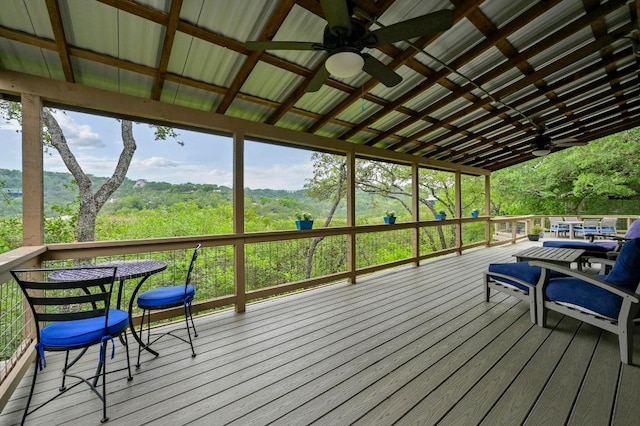 2009 S Oak Canyon Rd, Austin, TX 78746 - wooden terrace featuring a ceiling fan and outdoor dining space