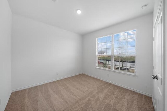 13505 Cerro Castellan Trce, Manor, TX 78653 - carpeted spare room with baseboards