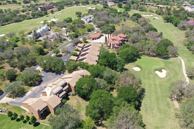 107 Lachite Unit 6, Horseshoe Bay, TX 78657 - aerial view of property and surrounding area featuring a local golf course and nearby suburban area